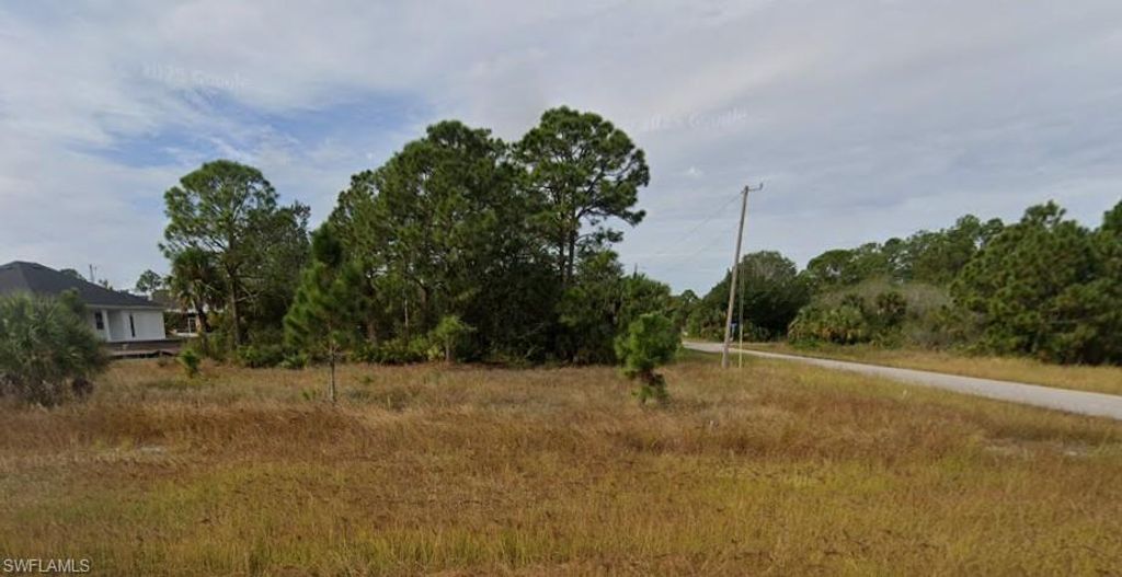 545 Columbus BLVD S, LEHIGH ACRES, FL 33974 — exterior