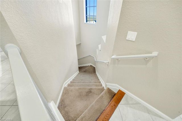 10060 Valiant CT 202, Miromar Lakes, FL 33913