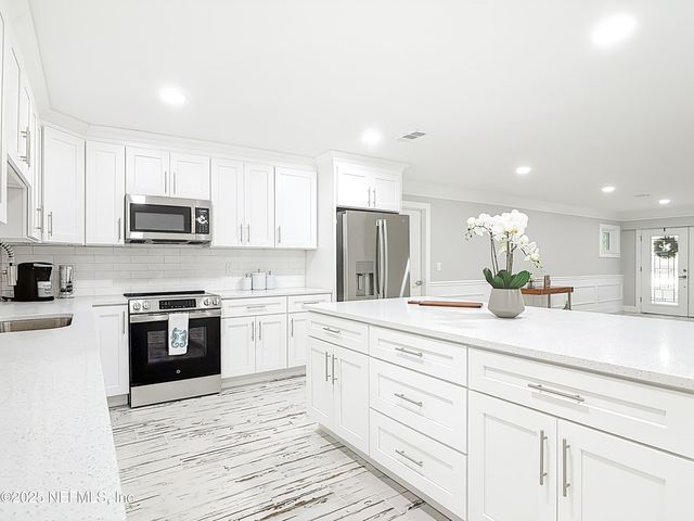 555 WILDWOOD Drive, New Smyrna Beach, FL 32168