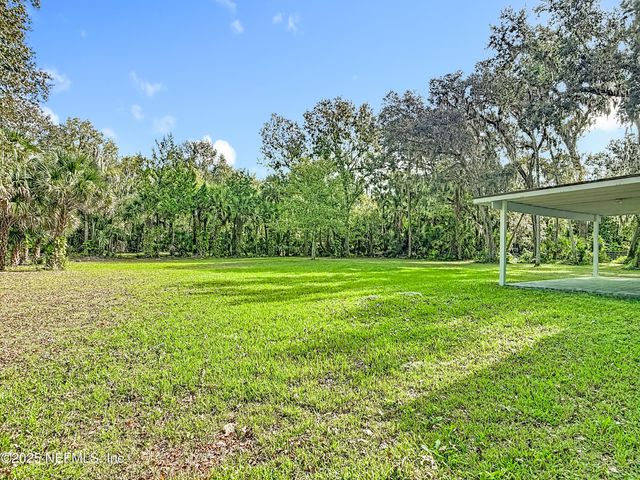 555 WILDWOOD Drive, New Smyrna Beach, FL 32168
