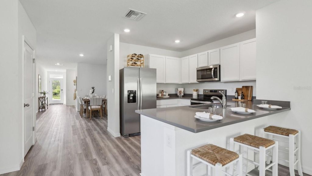 Image 13 of property listing at 12052 NOBLE CHASE PATH, Dade City, FL 33525