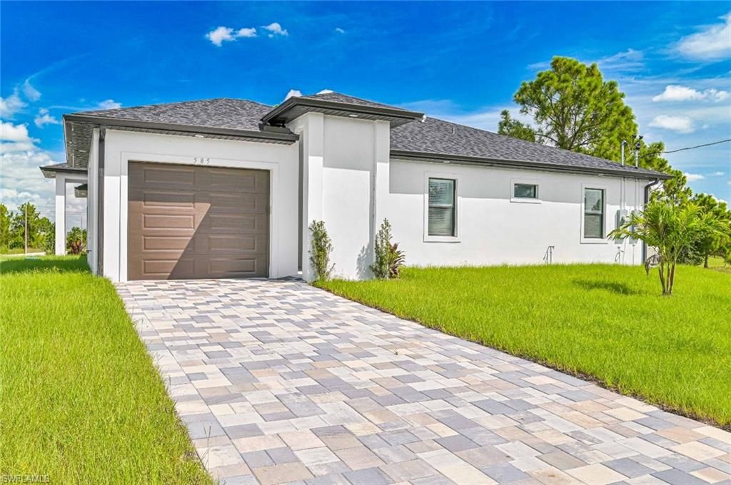 585/587 Alabama RD S, LEHIGH ACRES, FL 33974 — exterior
