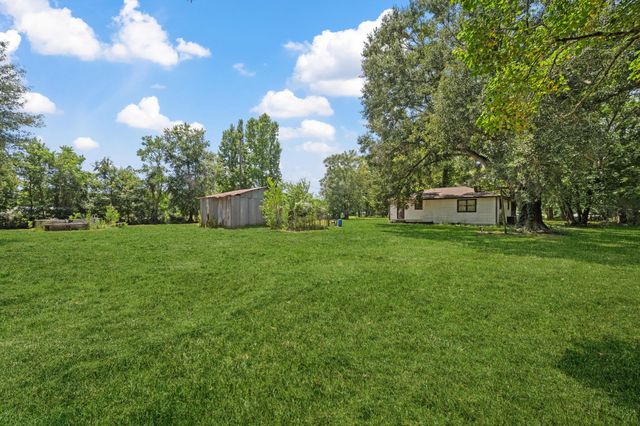 298 County Road 2197, Cleveland, TX 77327