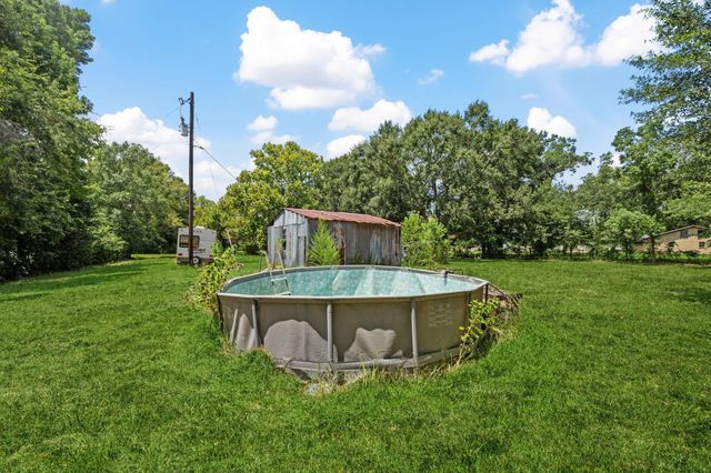 298 County Road 2197, Cleveland, TX 77327