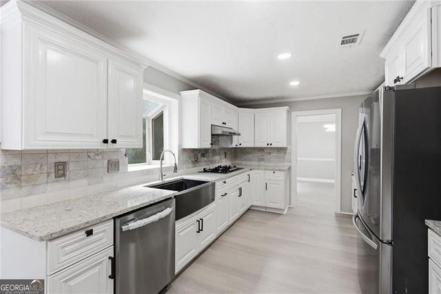 24 Planters Drive SW, Lilburn, GA 30047
