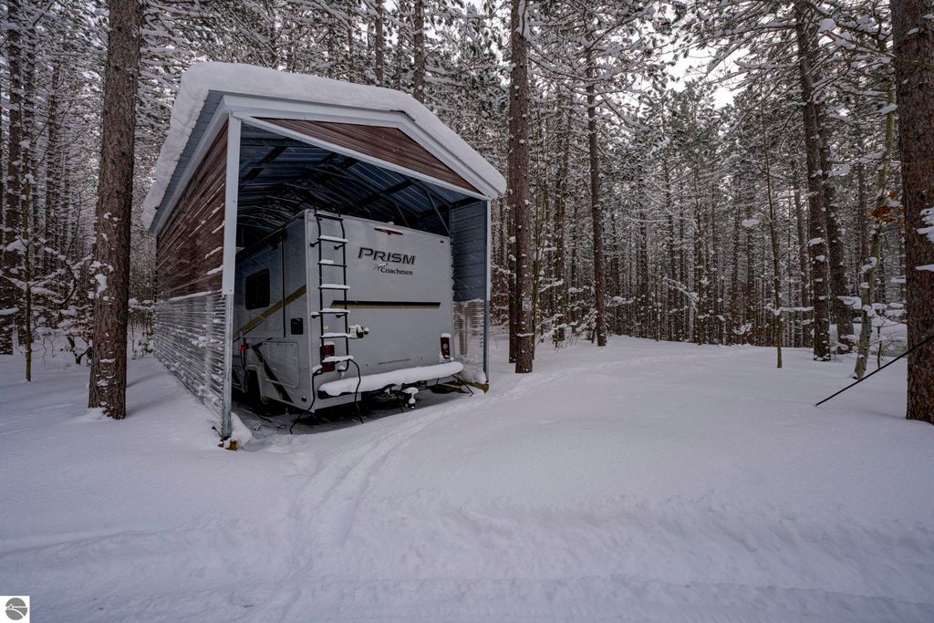 Image 63 of property listing at 16355 Hunt Club Road, Lake Ann, MI 49650