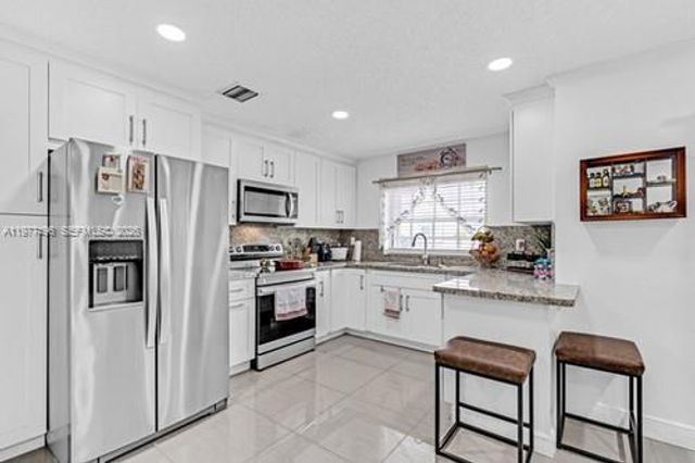 12696 NW 10th Ln, Miami, FL 33182