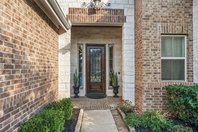 1002 Highclere Holly Court, Conroe, TX 77384