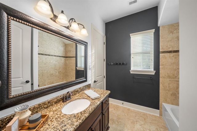 1002 Highclere Holly Court, Conroe, TX 77384