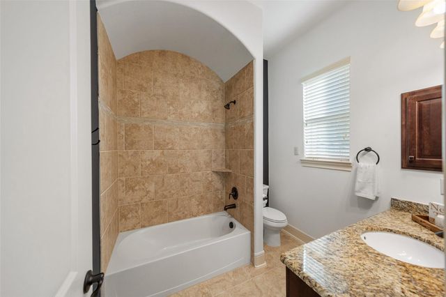 1002 Highclere Holly Court, Conroe, TX 77384