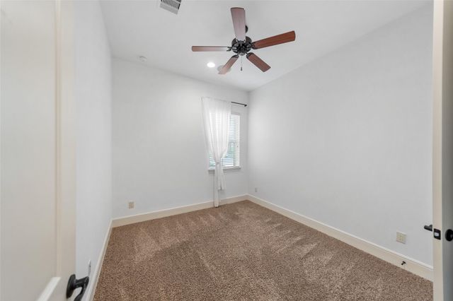 1002 Highclere Holly Court, Conroe, TX 77384