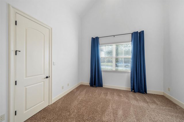 1002 Highclere Holly Court, Conroe, TX 77384