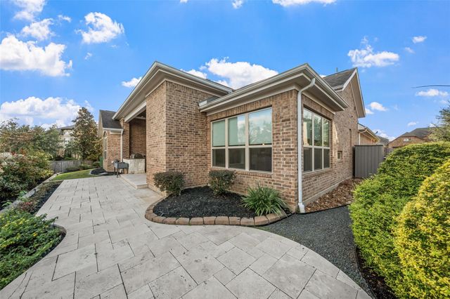 1002 Highclere Holly Court, Conroe, TX 77384