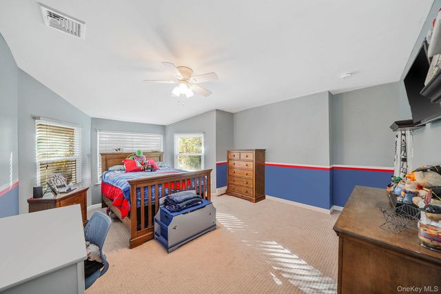 18 Ashford Drive, Ridge, NY 11961