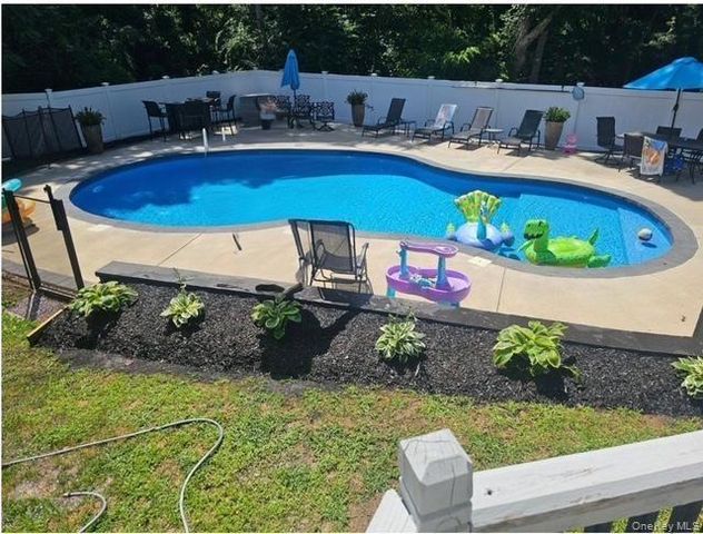 18 Ashford Drive, Ridge, NY 11961