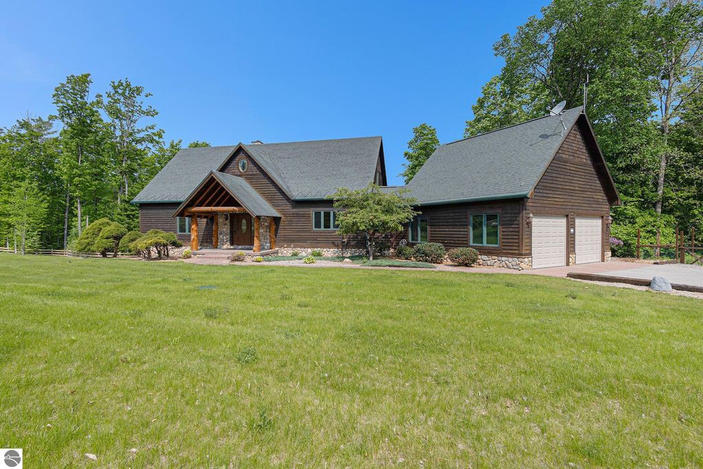 Image 14 of property listing at 5575 M 72, Williamsburg, MI 49690