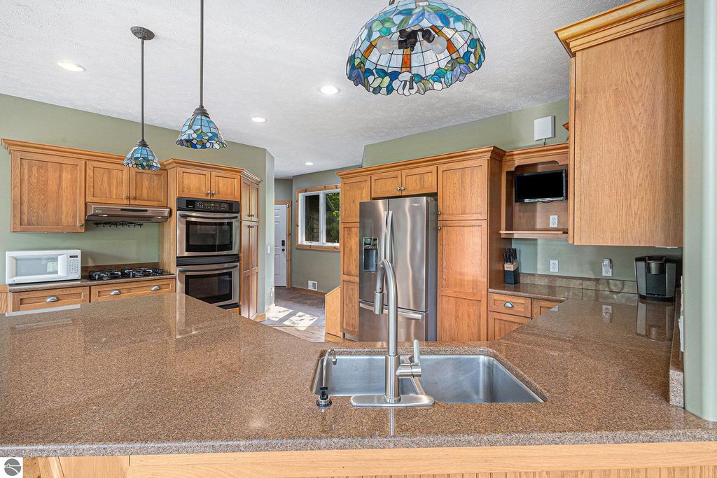 Image 21 of property listing at 5575 M 72, Williamsburg, MI 49690