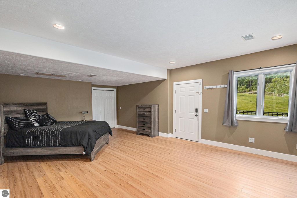 Image 32 of property listing at 5575 M 72, Williamsburg, MI 49690