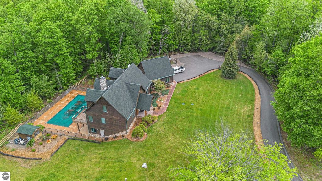 Image 5 of property listing at 5575 M 72, Williamsburg, MI 49690