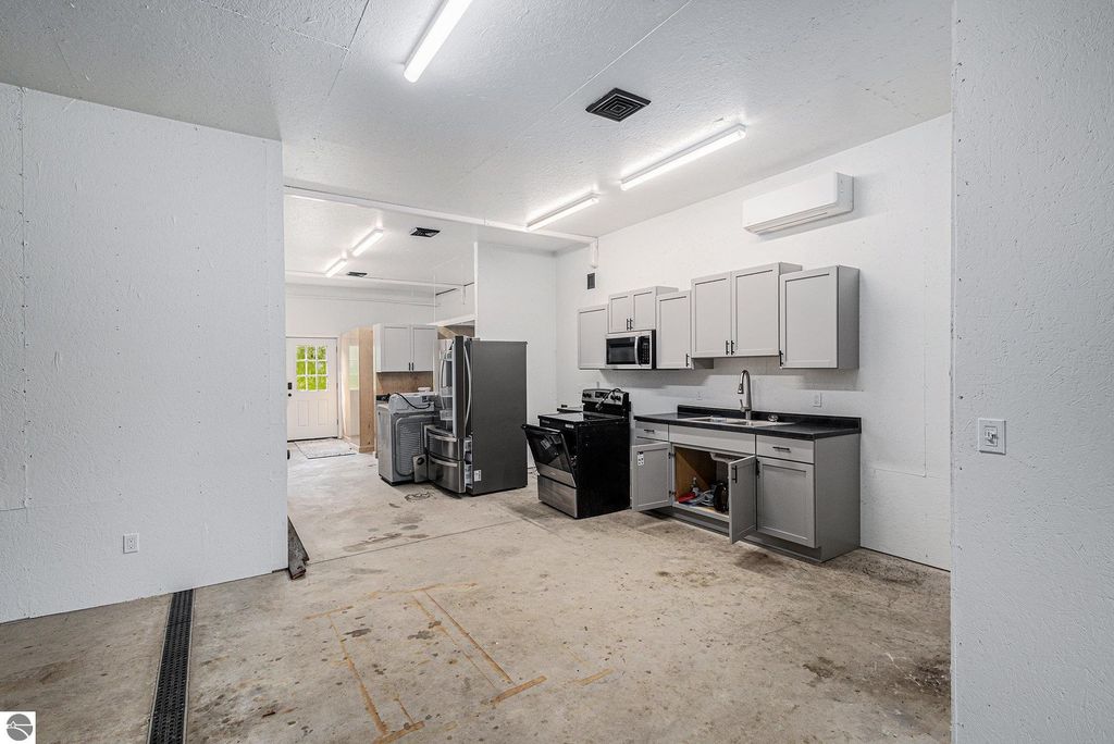 Image 48 of property listing at 5575 M 72, Williamsburg, MI 49690