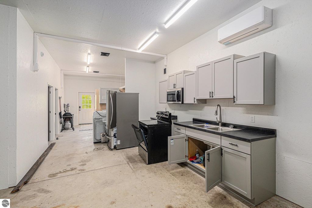 Image 49 of property listing at 5575 M 72, Williamsburg, MI 49690