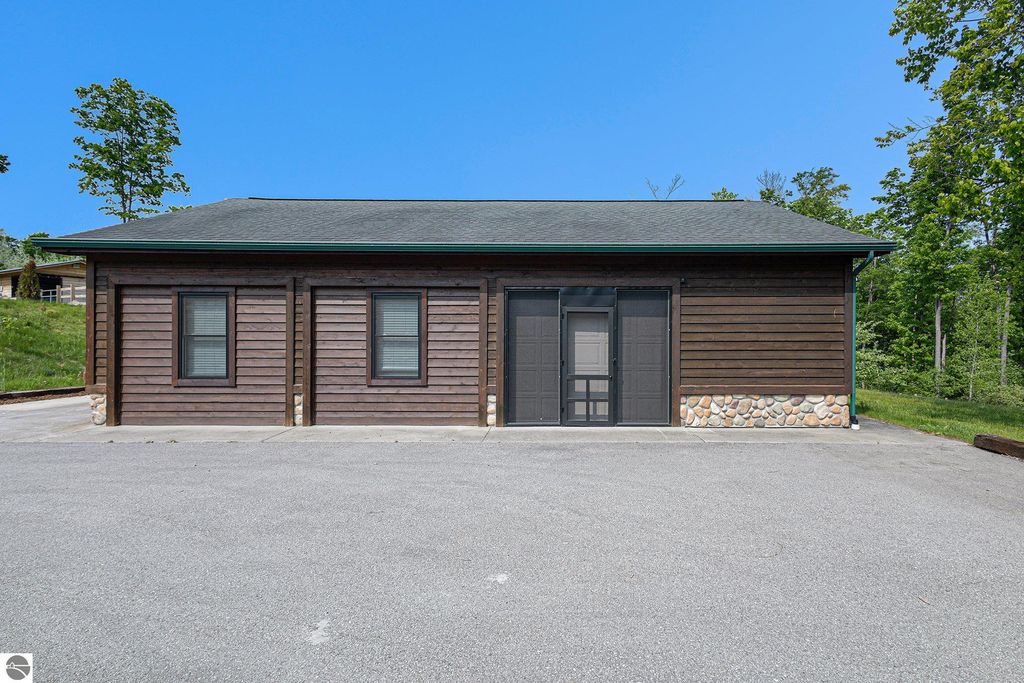 Image 54 of property listing at 5575 M 72, Williamsburg, MI 49690