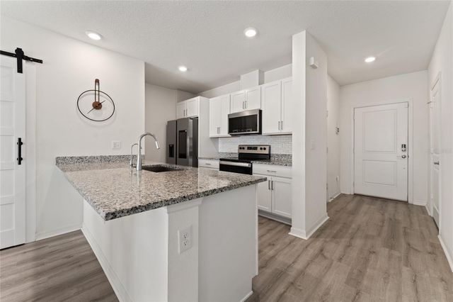 697 STONEY POINT CIRCLE, Davenport, FL 33896