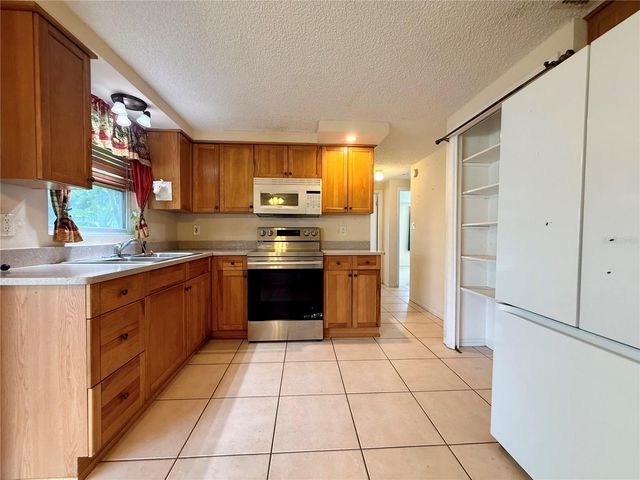 2414 TAHITIAN DRIVE, Holiday, FL 34691