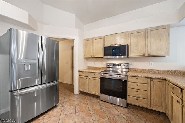 216 Aurora AVE S, Lehigh Acres, FL 33974