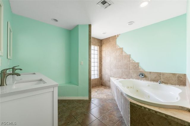 216 Aurora AVE S, Lehigh Acres, FL 33974