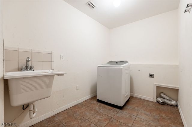 216 Aurora AVE S, Lehigh Acres, FL 33974