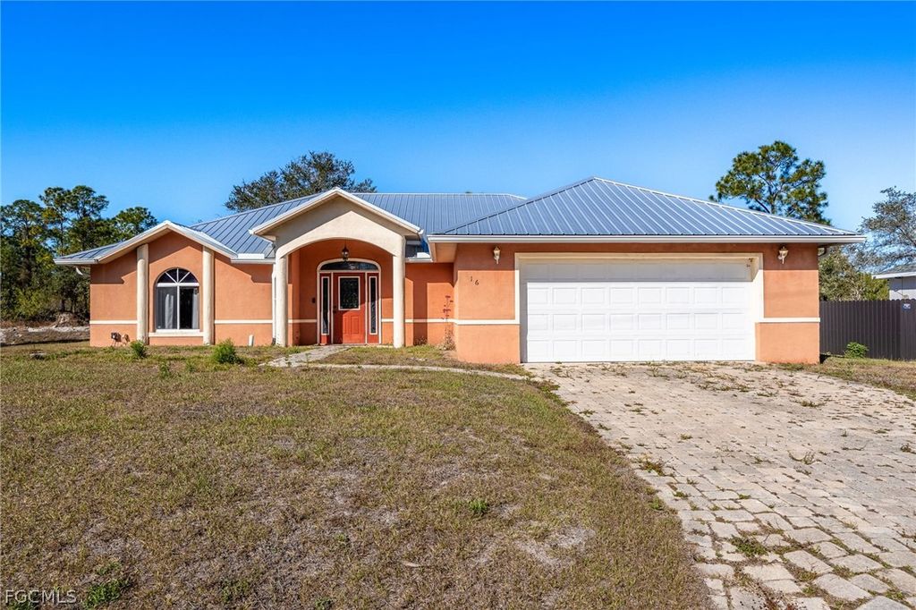 216 Aurora AVE S, Lehigh Acres, FL 33974