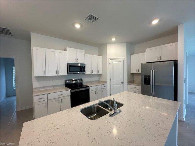 12341 Amber Waves RD, Lehigh Acres, FL 33974