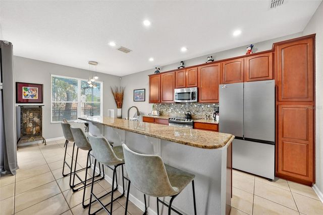 7755 GRASSENDALE STREET, Kissimmee, FL 34747