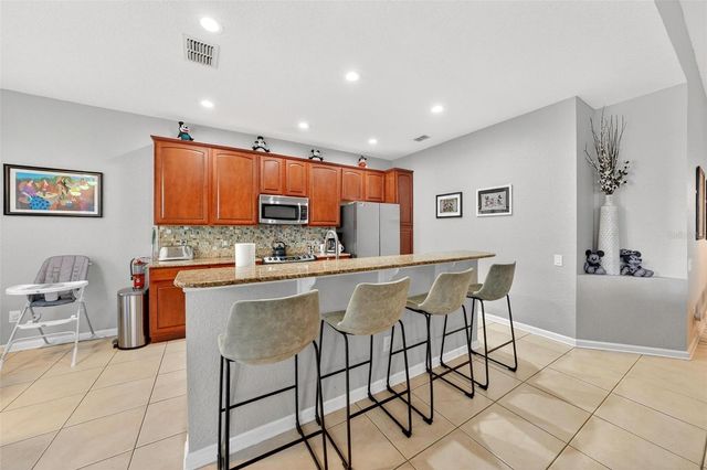 7755 GRASSENDALE STREET, Kissimmee, FL 34747