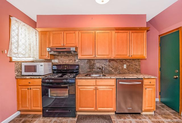 65-56 77th Place, Middle Village, NY 11379