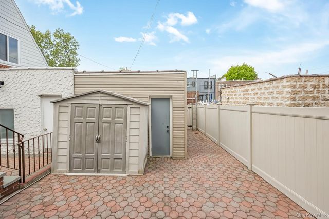 65-56 77th Place, Middle Village, NY 11379