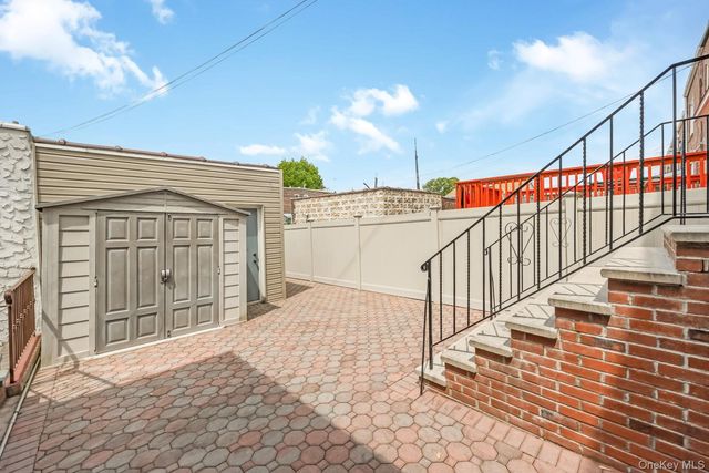 65-56 77th Place, Middle Village, NY 11379