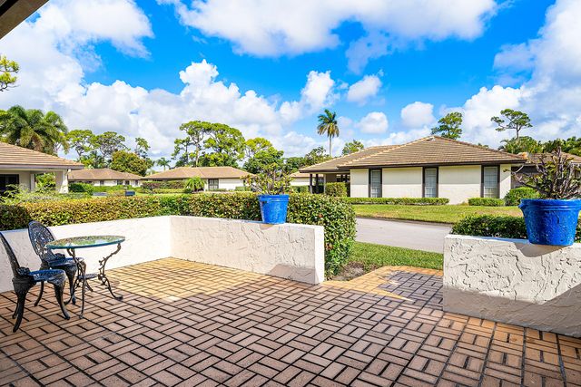 446 Pine Villa Drive, Atlantis, FL 33462