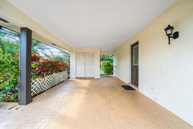 446 Pine Villa Drive, Atlantis, FL 33462