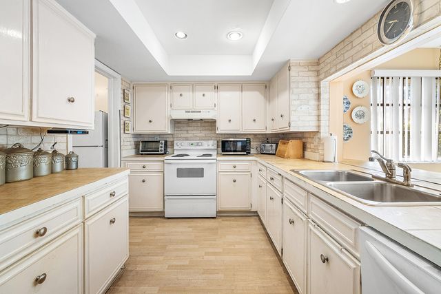 446 Pine Villa Drive, Atlantis, FL 33462