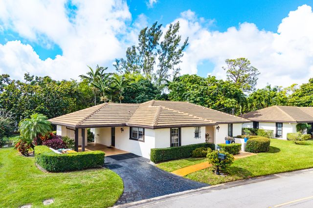 446 Pine Villa Drive, Atlantis, FL 33462