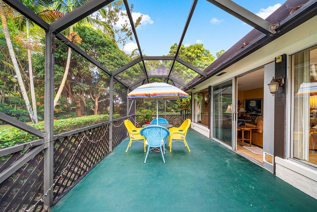 446 Pine Villa Drive, Atlantis, FL 33462