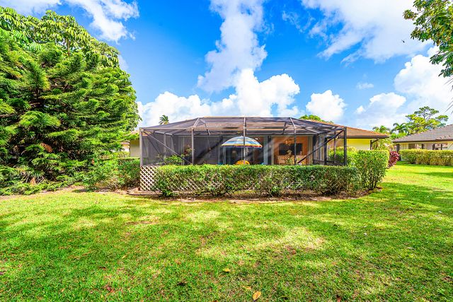 446 Pine Villa Drive, Atlantis, FL 33462