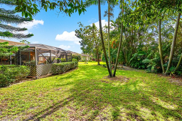 446 Pine Villa Drive, Atlantis, FL 33462