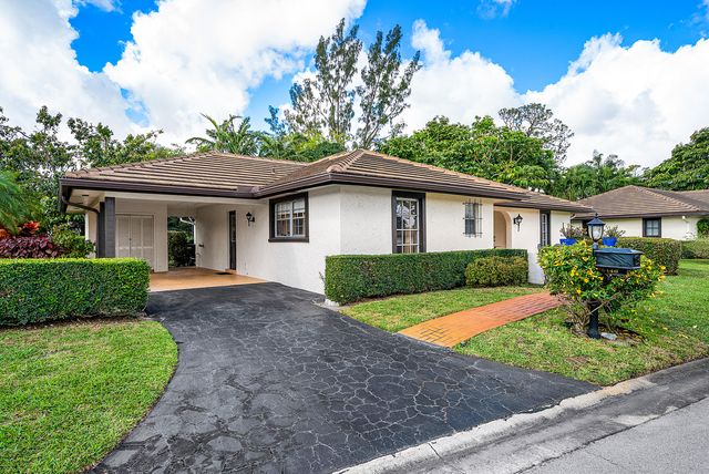 446 Pine Villa Drive, Atlantis, FL 33462