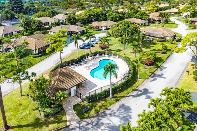 446 Pine Villa Drive, Atlantis, FL 33462