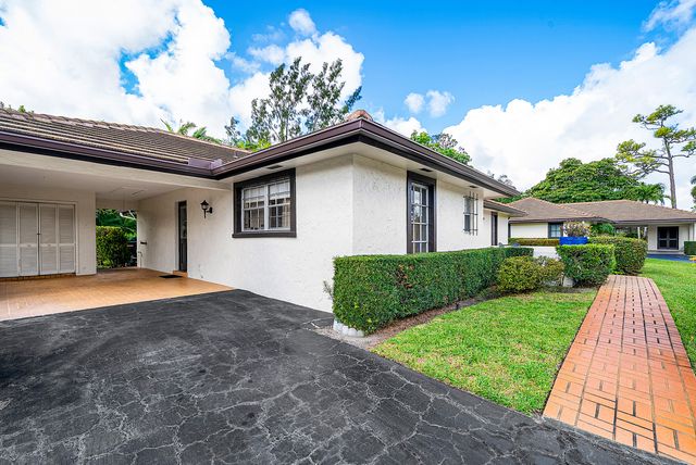 446 Pine Villa Drive, Atlantis, FL 33462