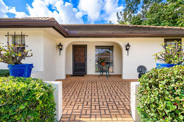 446 Pine Villa Drive, Atlantis, FL 33462