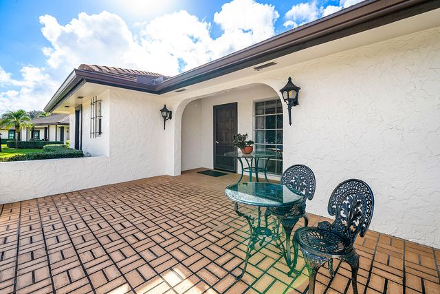 446 Pine Villa Drive, Atlantis, FL 33462